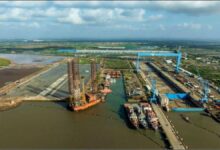 A large bulk carrier ship at sea, representing new ammonia-fuelled maritime technology.