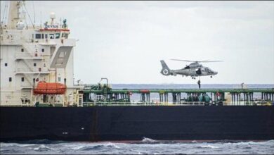 French troops board a tanker during a maritime security enforcement operation.